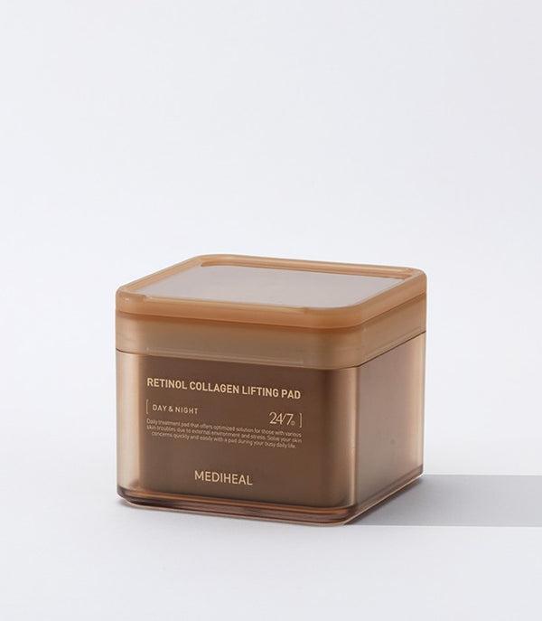 Square container labeled "MEDIHEAL - Retinol Collagen Lifting Pad 100ea" by MEDIHEAL. The container has a minimalist design with a brown semi-transparent body and matching lid. The text on the label indicates that the pads, infused with retinol and collagen, are suitable for both day and night use, targeting fine lines and wrinkles.