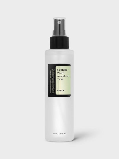 A cylindrical white spray bottle with a black cap labeled "COSRX - Centella Water Alcohol-Free Toner 150ml" by COSRX, featuring Centella Asiatica from Jeju Island. The 150 mL (5.07 fl. oz.) bottle has a black label with white and light green text, set against a light gray background, promising soothing & hydrating benefits.