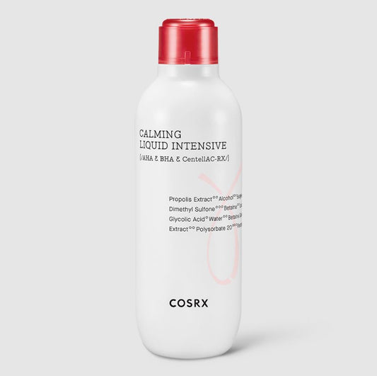 A white plastic bottle with a red cap labeled "COSRX - AC Collection Calming Liquid Intensive 125ml" and "COSRX." This effective acne treatment features ingredients like Propolis Extract and Glycolic Acid Water, perfect for a soothing skincare routine.