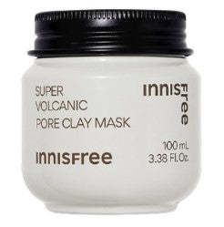 A 100 mL white jar of INNISFREE - Super Volcanic Pore Clay Mask 100ml with a black lid. Infused with Jeju Super Volcanic Clusters for deep-cleansing, the jar features the brand name and product details in brown and black text.