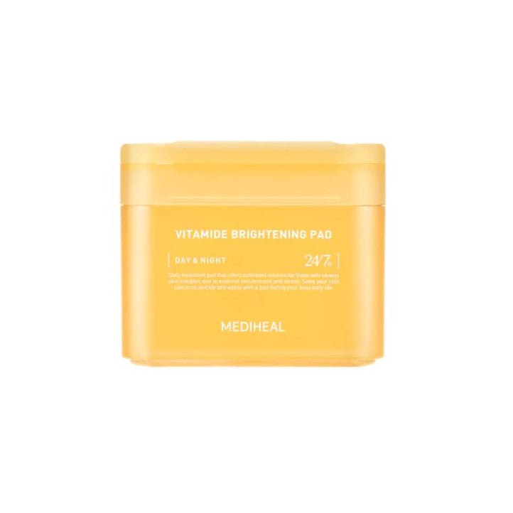 A bright yellow rectangular container of MEDIHEAL - Vitamide Brightening Pad 100ea, also known as the glow-getter pad. The label indicates its use for both day and night skincare, promoting radiant skin with its niacinamide formula.
