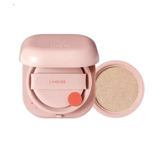 A pink LANEIGE Neo Cushion Glow SPF46 PA++ - 15g *2ea compact case is shown, with the lid open. Inside, there is a sponge applicator marked "LANEIGE" on its holder and a beige 24-hour glow cushion foundation pad to the right. The case has a smooth, rounded design and features Blue Hyaluronic Acid for hydration.