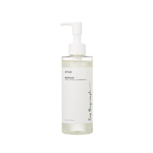 A product image of an ANUA - Heartleaf Pore Control Cleansing Oil 200ml. The clear bottle with a pump dispenser contains a light liquid and has a minimalistic design with white labeling, displaying its brand and product name. Infused with heartleaf extract, it's perfect for acne-prone skin.