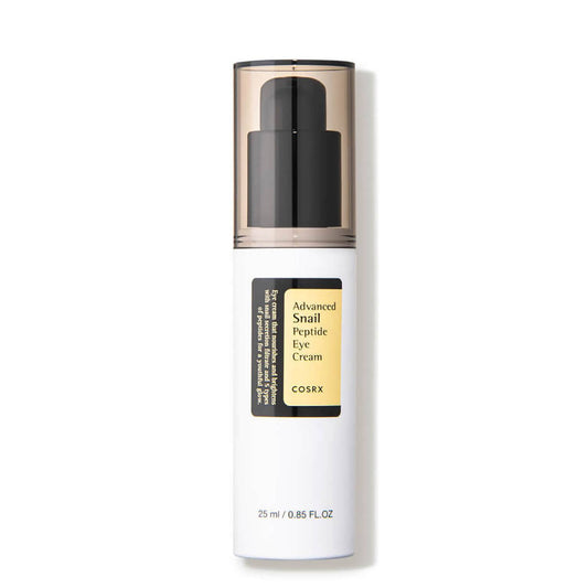 A white bottle with a beige and black cap labeled "COSRX - Advanced Snail Peptide Eye Cream 25ml" by COSRX, containing 25 ml (0.85 FL. OZ) of product. Formulated with snail secretion filtrate to target dark circles, the bottle features a pump dispenser and a black and gold label with additional text in white.