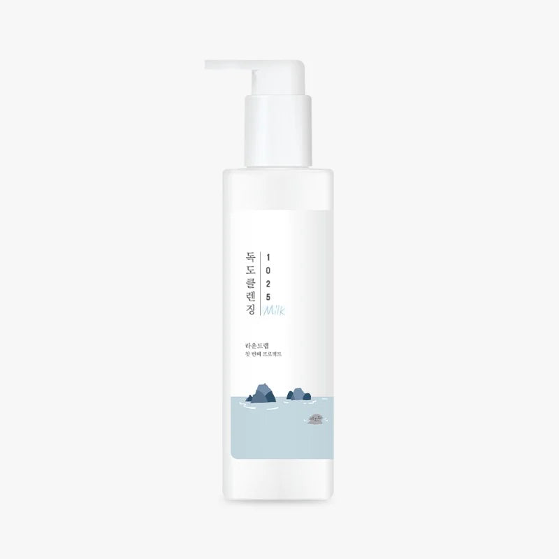 A white cylindrical bottle with a pump dispenser containing a skincare product for sensitive skin. The label features a minimalist illustration of a sea with islands and Korean text, along with the text "Hydration Hero - Dry & Sensitive Skin" and "K.inc Beauty." The bottle is set against a plain white background.