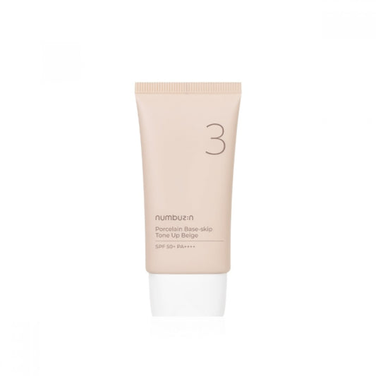 A beige-toned cosmetic tube with a white cap, labeled "NUMBUZIN - No.3 Porcelain Base-skip Tone Up Beige 50ml," marked with "SPF 50+ PA++++." This multifunctional tone-up cream features skin-calming ingredients and a minimalist design, with the number "3" prominently displayed at the top.