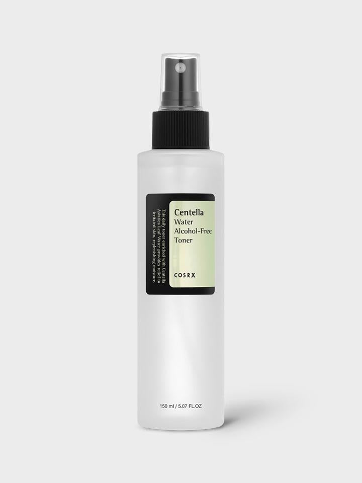 A white bottle of COSRX - Centella Water Alcohol-Free Toner 150ml with a black spray cap and label, infused with soothing and hydrating Centella Asiatica from Jeju Island. The bottle contains 150 ml (5.07 fl. oz) of toner, with the product name and brand displayed in black and green text on a plain white background.